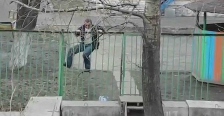 Drunk guy passing over the fence